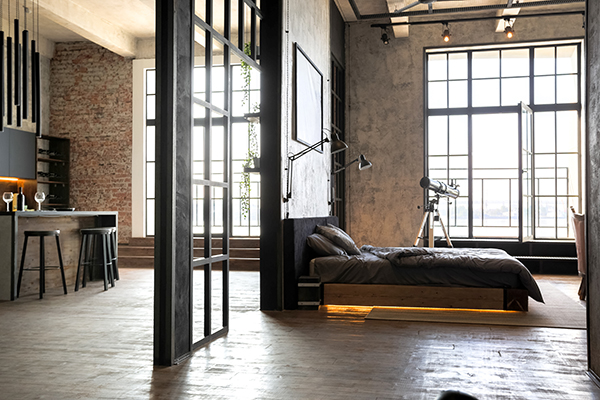 Tágas, ipari stílusban berendezett modern loft lakás hatalmas ablakokkal, nyitott térrel és kreatív elrendezéssel Tágas, ipari stílusban berendezett modern loft lakás hatalmas ablakokkal, nyitott térrel és kreatív elrendezéssel